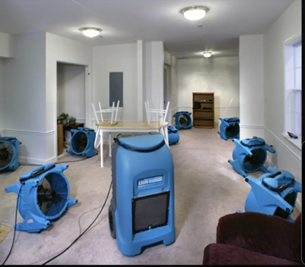 Air movers and dehumidifier setup for Water Damage Restoration in Mission Bend
